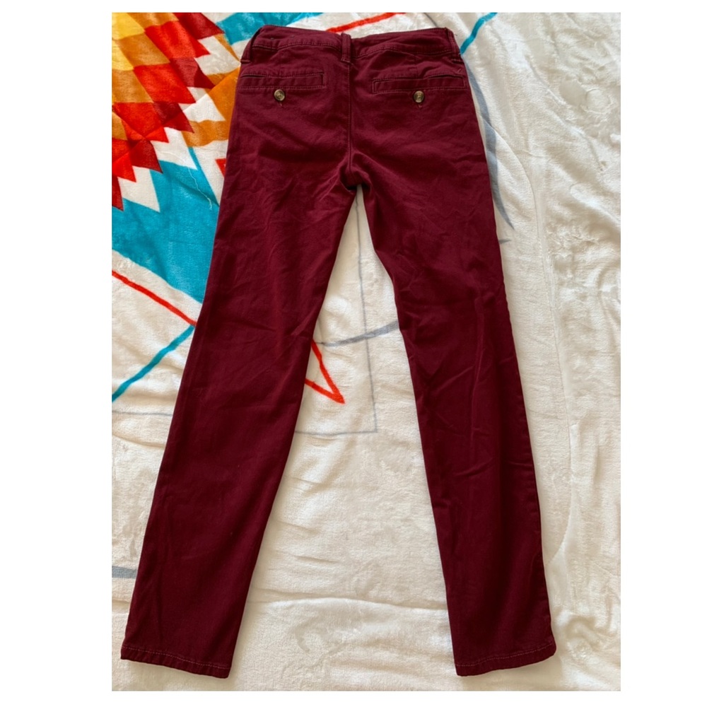 AE super stretch maroon skinny jean